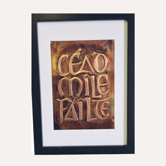 A framed Céad Mile Fáilte symbol