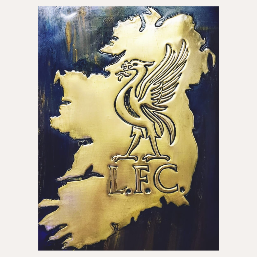 Handcrafted copper artwork featuring the Liverpool FC crest embedded within a map of Ireland, symbolizing Irish pride and unwavering support for the club.