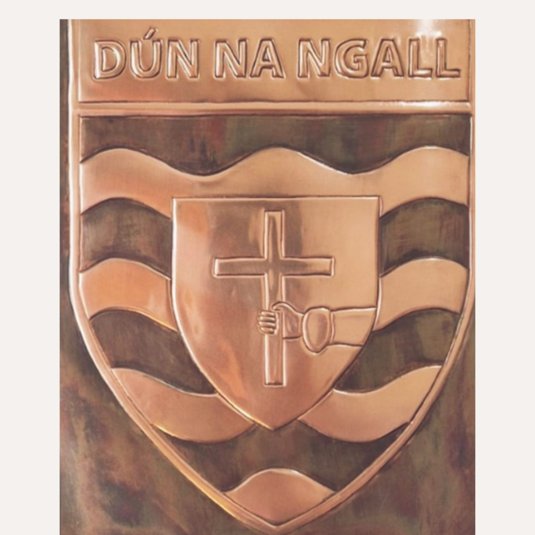 Handcrafted copper plaque featuring the Donegal GAA crest (Dún na nGall), framed and mounted for wall display