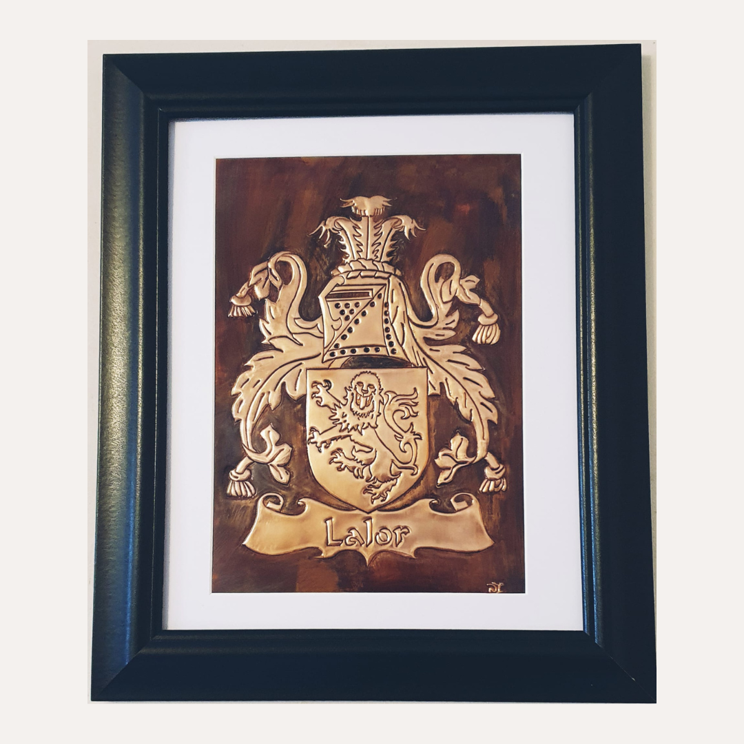 Handcrafted copper artwork featuring the Lalor family crest with intricate heraldic details and a lion emblem, symbolizing heritage and lineage