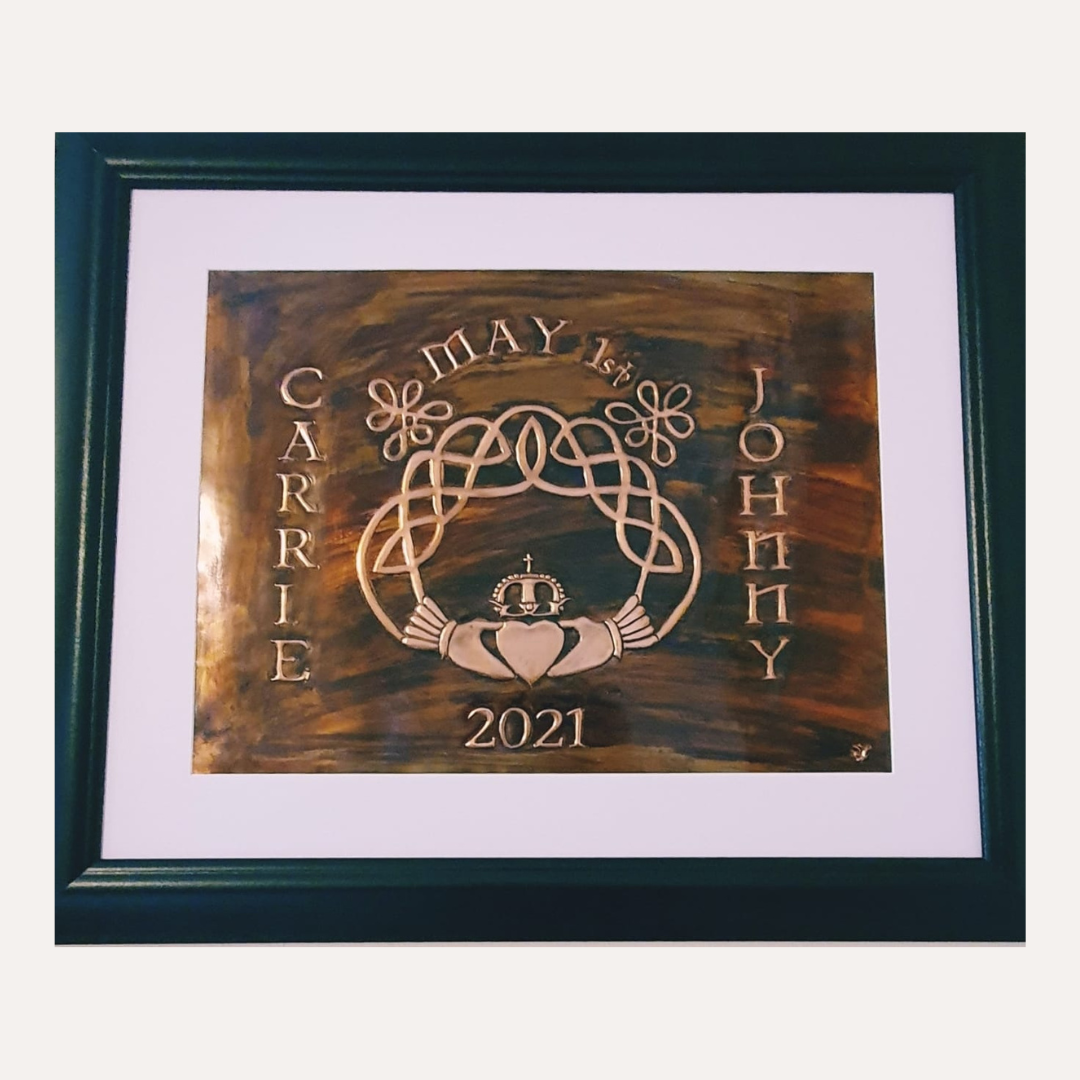 Personalised handcrafted copper Celtic Claddagh wedding plaque featuring intertwined knotwork, names, date, and traditional Irish heart-and-crown design.