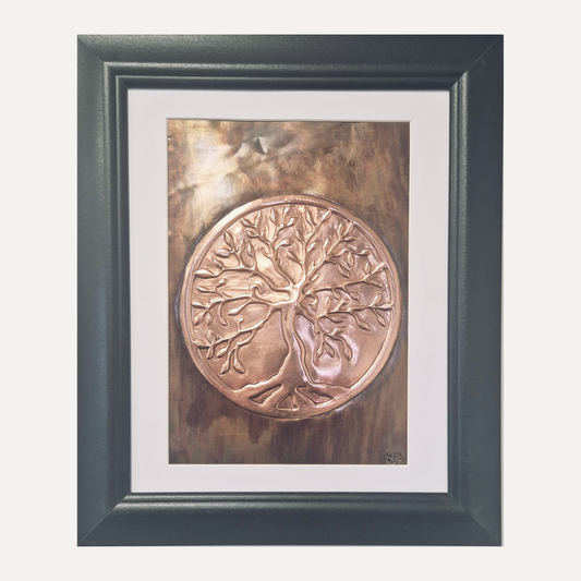 Framed handcrafted copper Tree of Life artwork with embossed detailing, finished in a black frame and white mount.