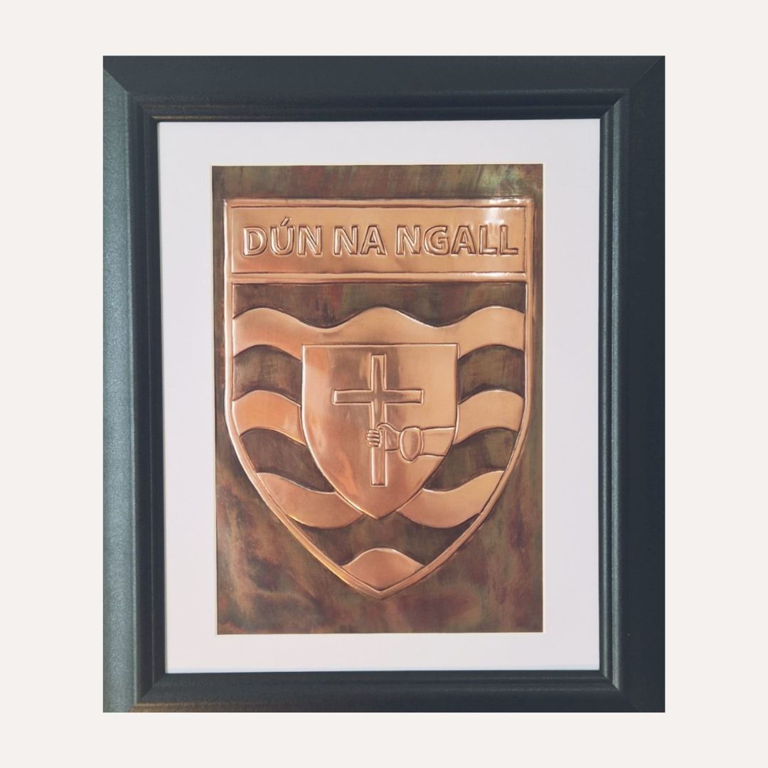 Handcrafted copper plaque featuring the Donegal GAA crest (Dún na nGall), framed and mounted for wall display