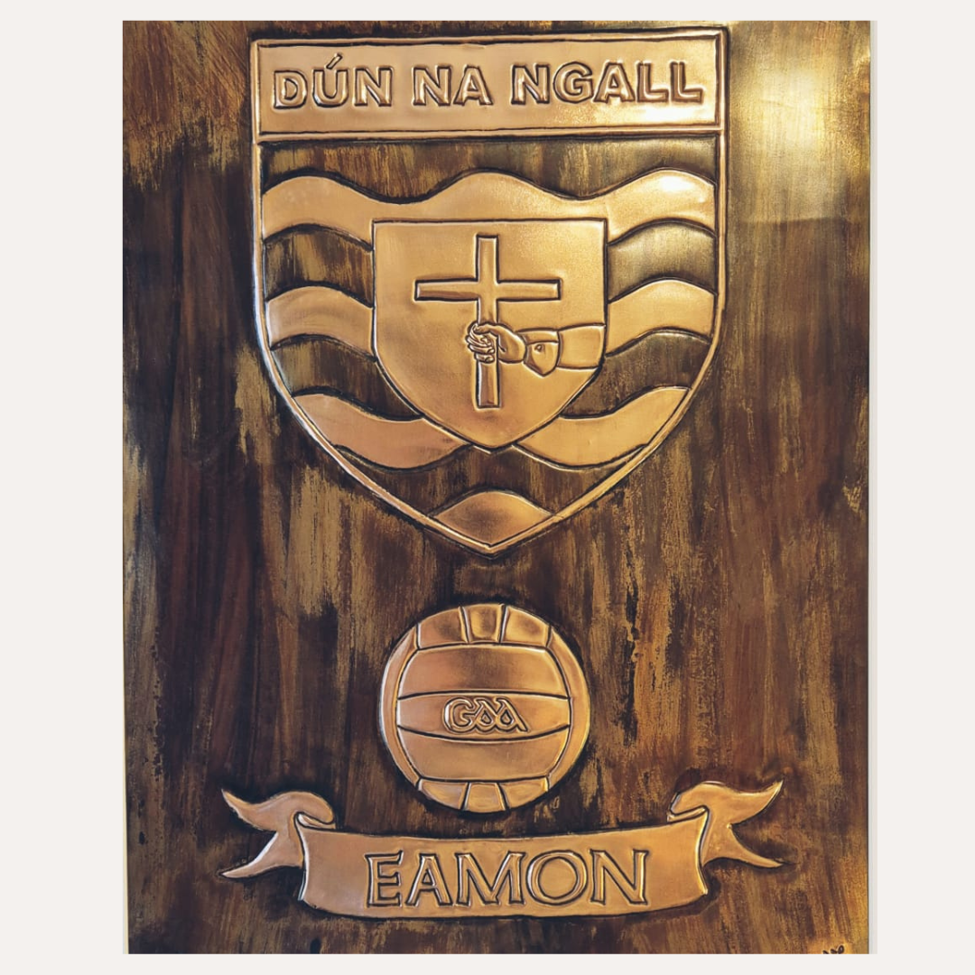 Detailed personalised copper Donegal GAA crest plaque with engraved football and name