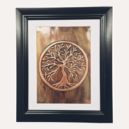 The Tree of Life symbolises connection, balance, and continuity. Its roots represent grounding, heritage, and our connection to the past; the trunk signifies strength and personal growth; and the branches reaching upward reflect renewal, hope, and the link between earth, sky, and spirit.